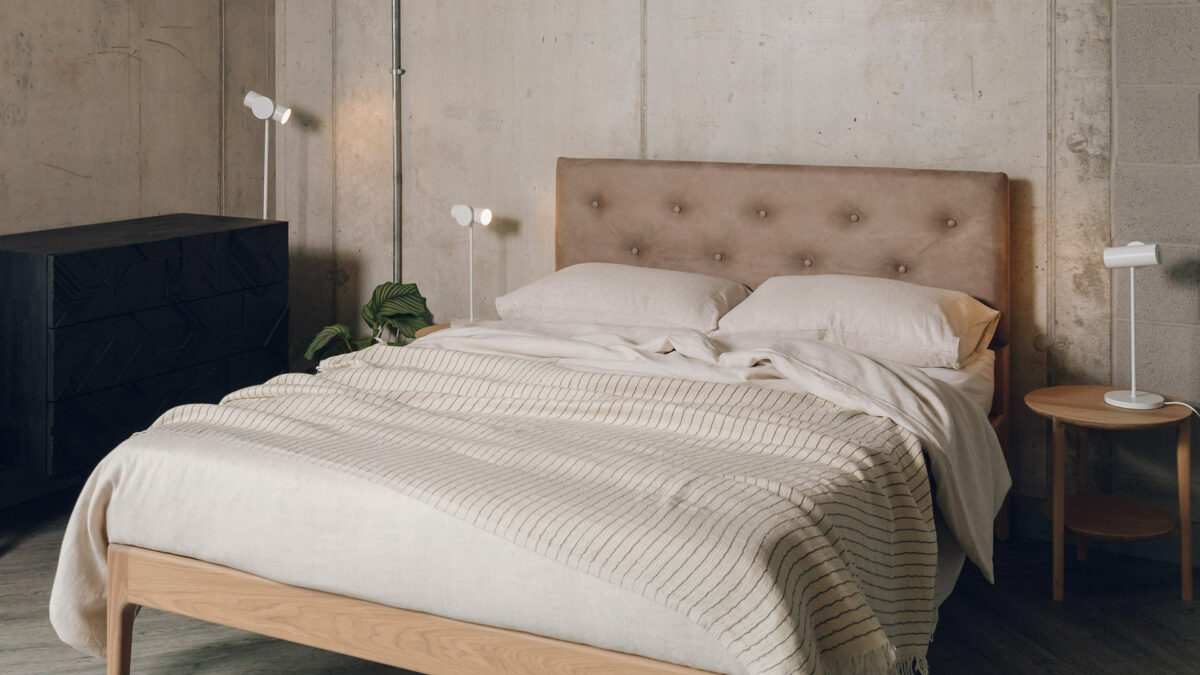 neutral naturals colour scheme, ecru linen duvet set with a striped cotton throw shown on our Bloomsbury bed with faux leather headboard