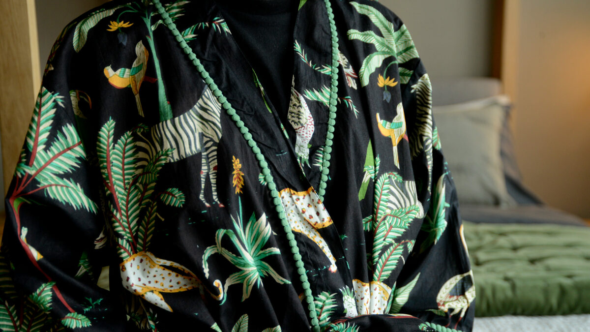 black jungle pattern robe with pompom detail