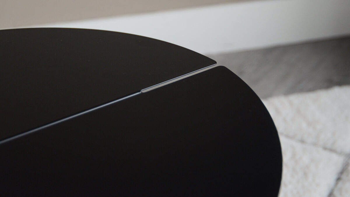 black metal side table slot detail close up
