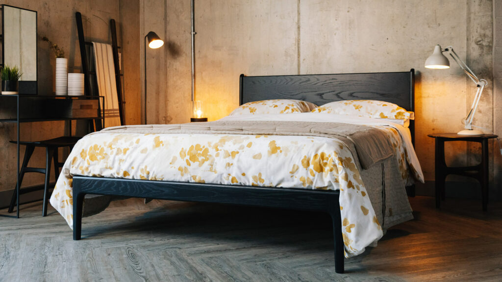 black oak camden bed with yellow ink flower duvet set