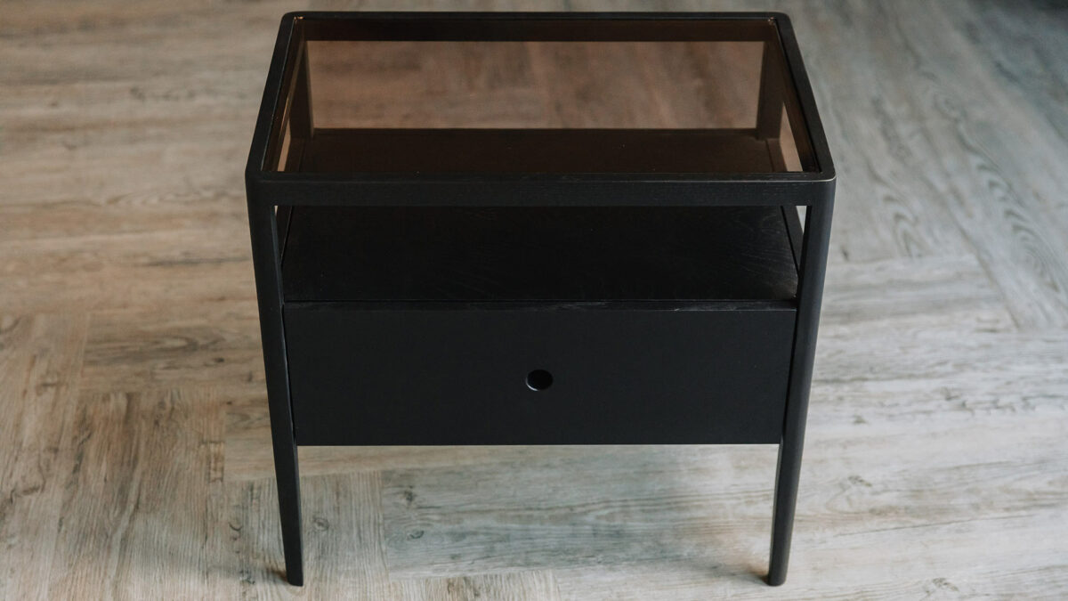 black oak Spindle bedside table with glass top, storage drawer and shelf