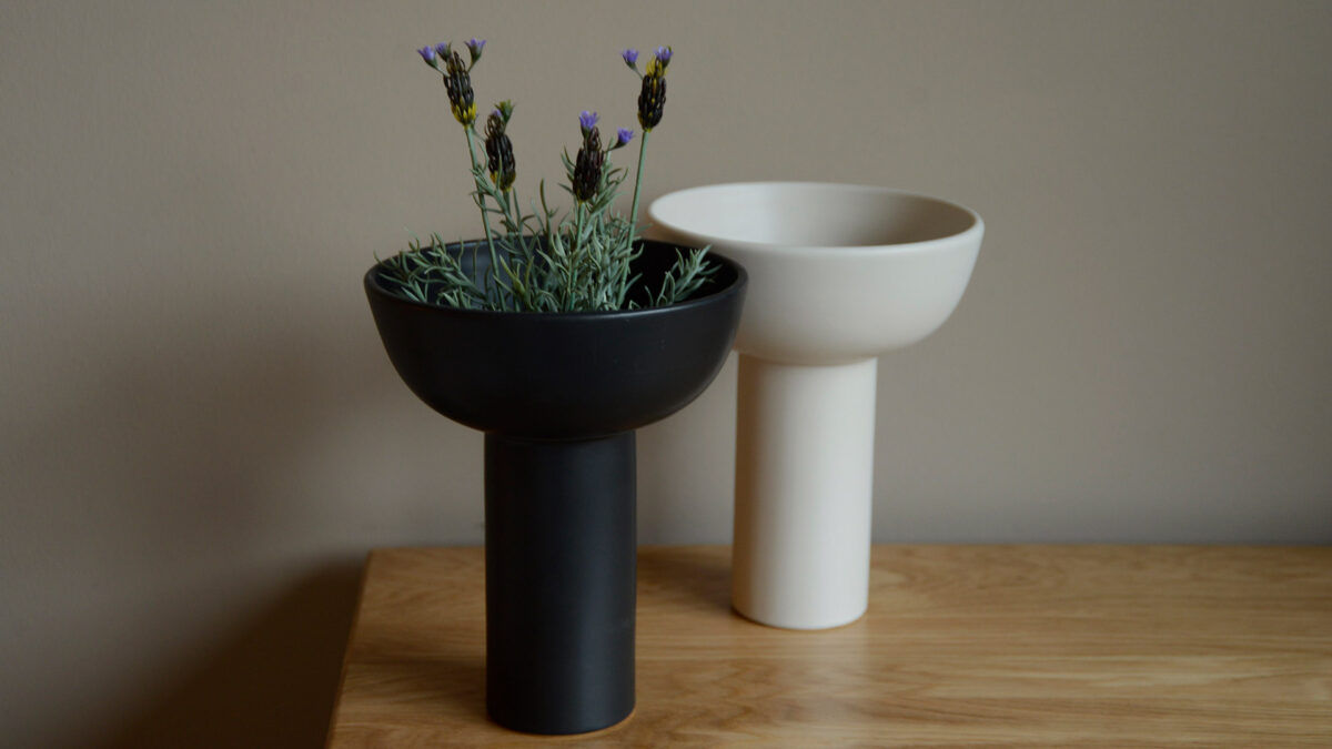modern ceramic vases in ivory and black