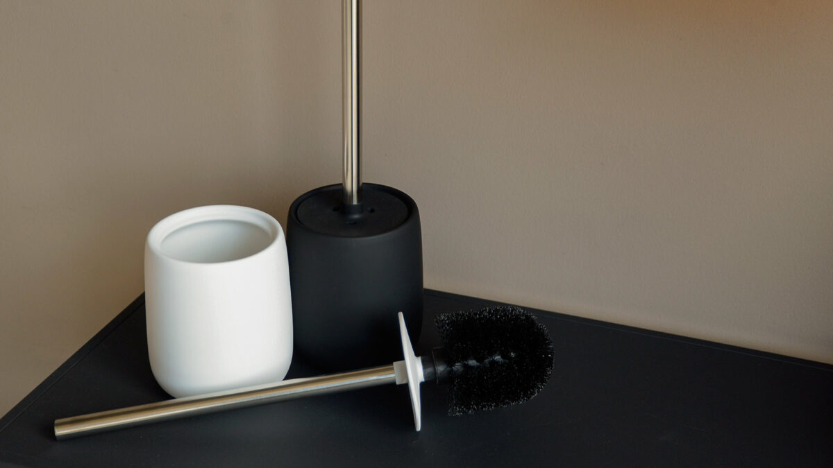 soft touch toilet brush set with stainless steel handles in black and white