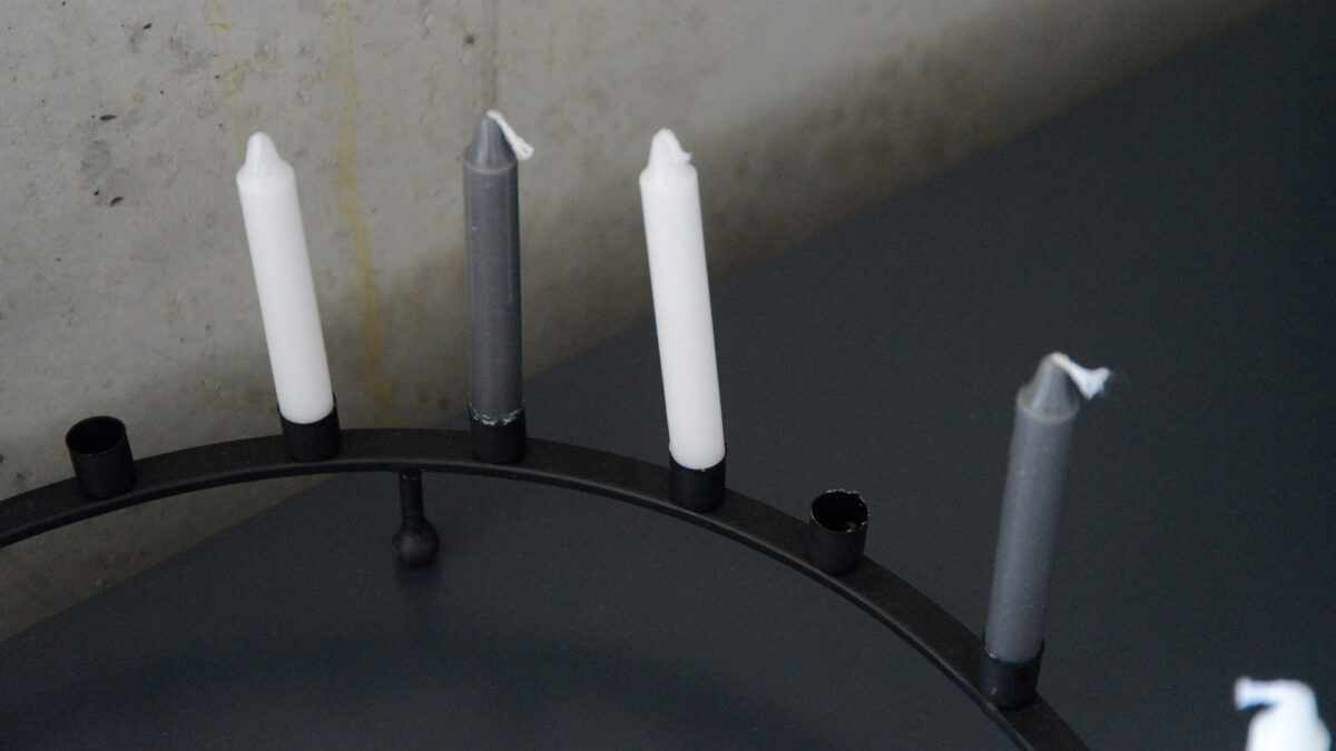 circular black metal candle holder