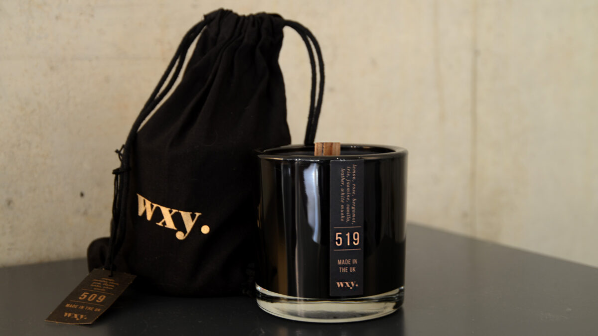 woodwick scented candle in sophisticated black glass jar with gift bag