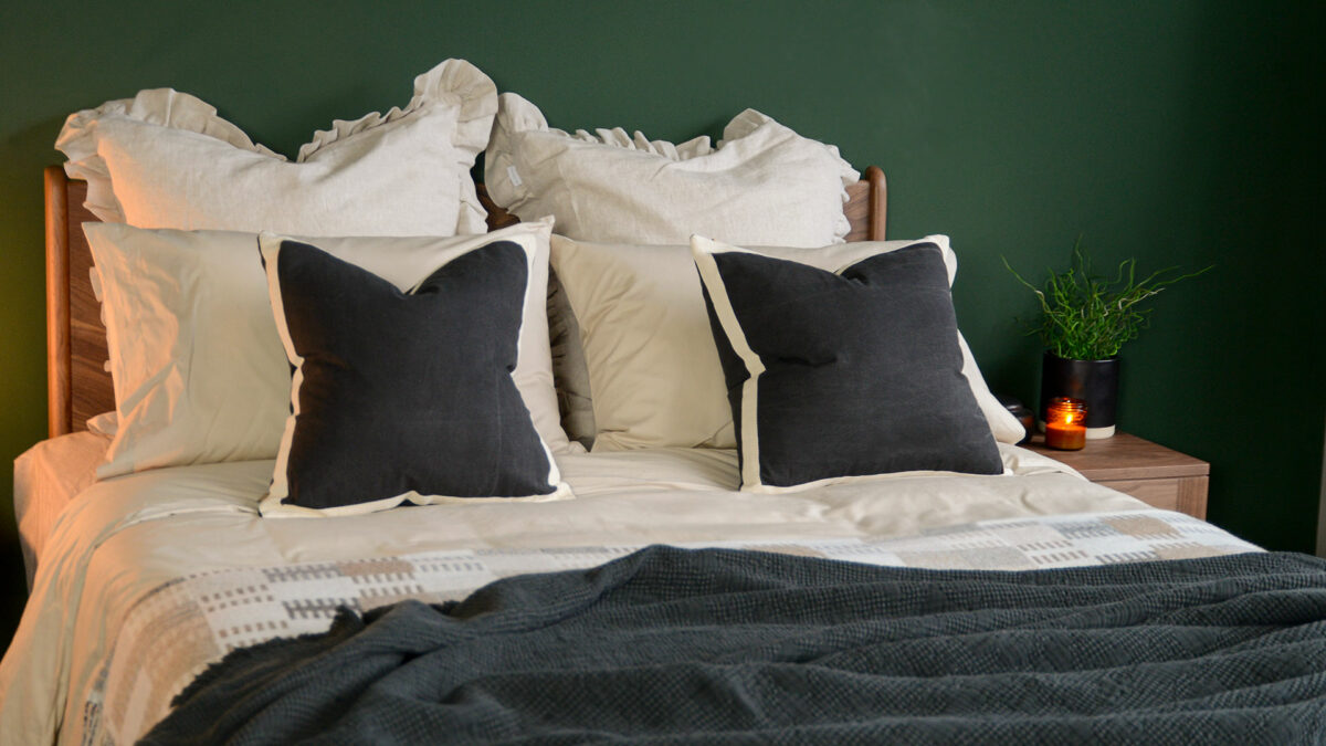 black cotton cushions with sand coloured edges