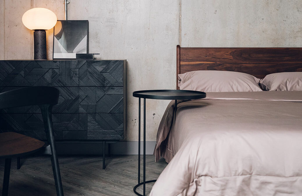 black textured front drawers with oiled walnut bed portrait