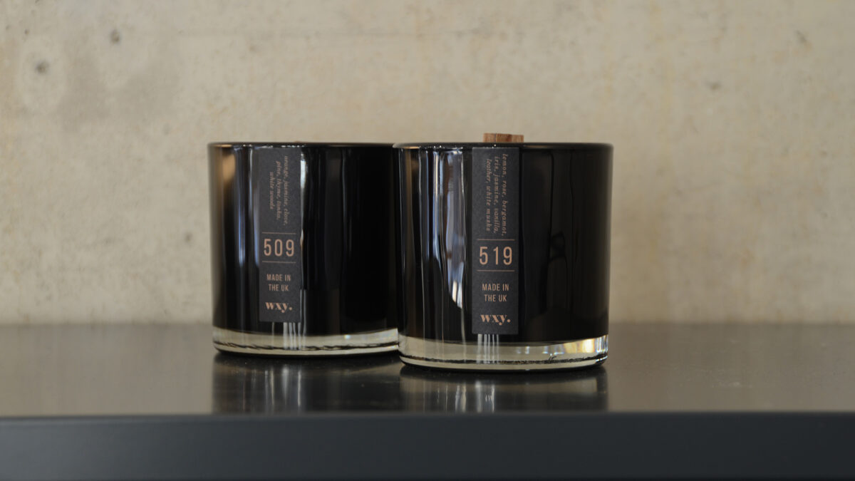 Black wax woodwick scented candles in sophisticated black glass jars