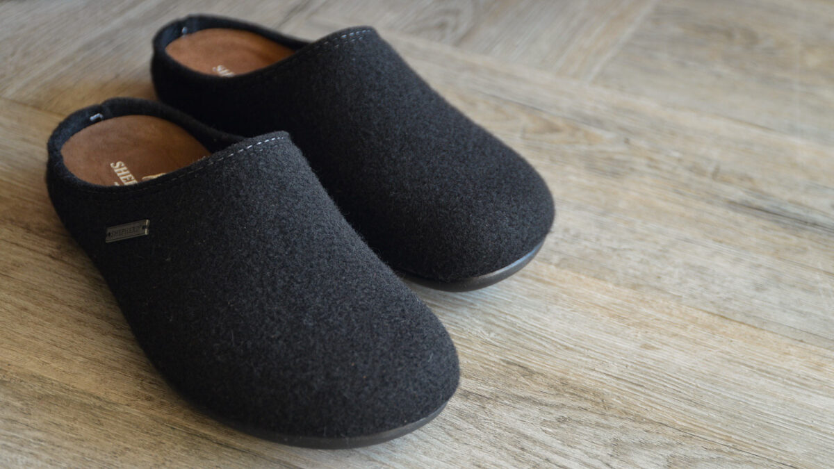 pair of men's black slippers.