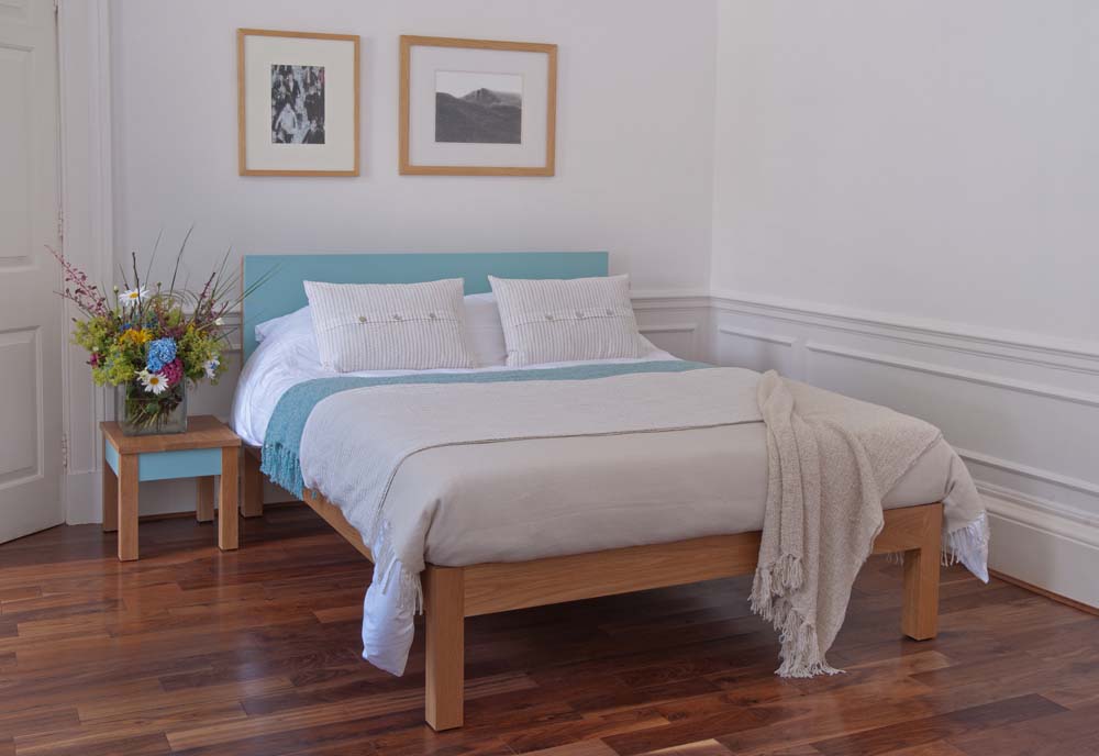 guest bedroom styles - Tao wooden bed frame with a colourful painted headboard