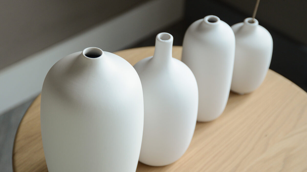 matt white ceramic vases in a range of sizes and shapes