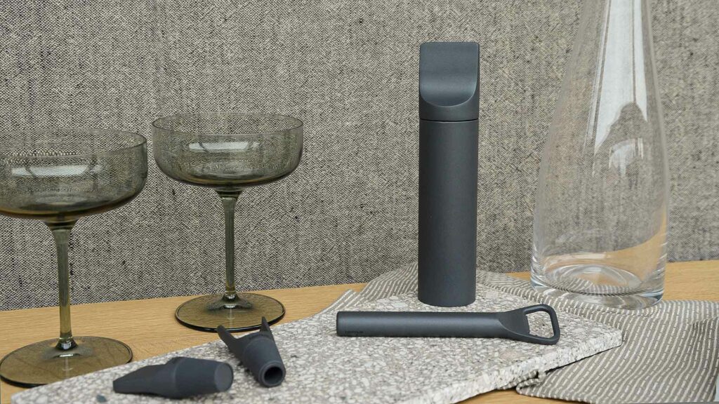 modern bar accessories corkscrew, bottle opener, bottle stopper and wine aerator