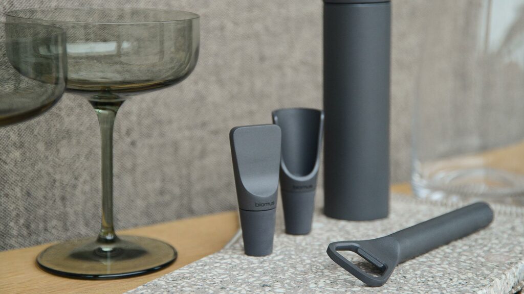 modern bar accessories corkscrew, bottle opener, bottle stopper and aerator