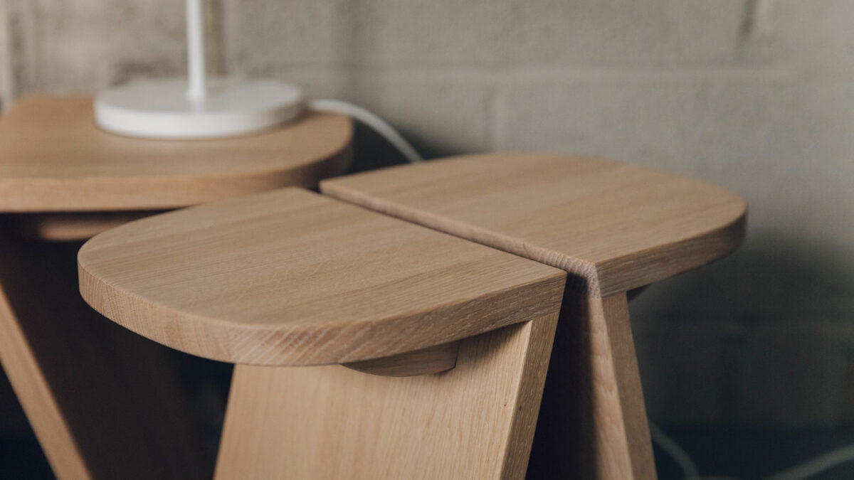 sulptural japanese style stool in oak shown close up