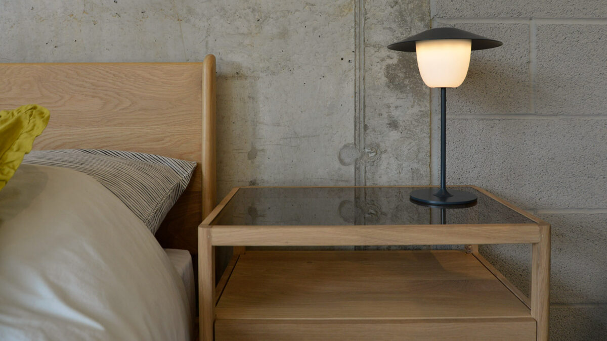 Blomus Rechargeable Lamp - on a Spindle Bedside Table in solid oak