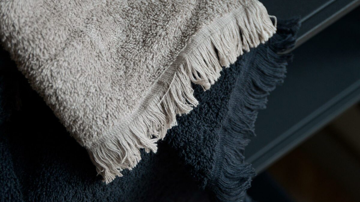 blomus tassle stone and charcoal towels detail close up