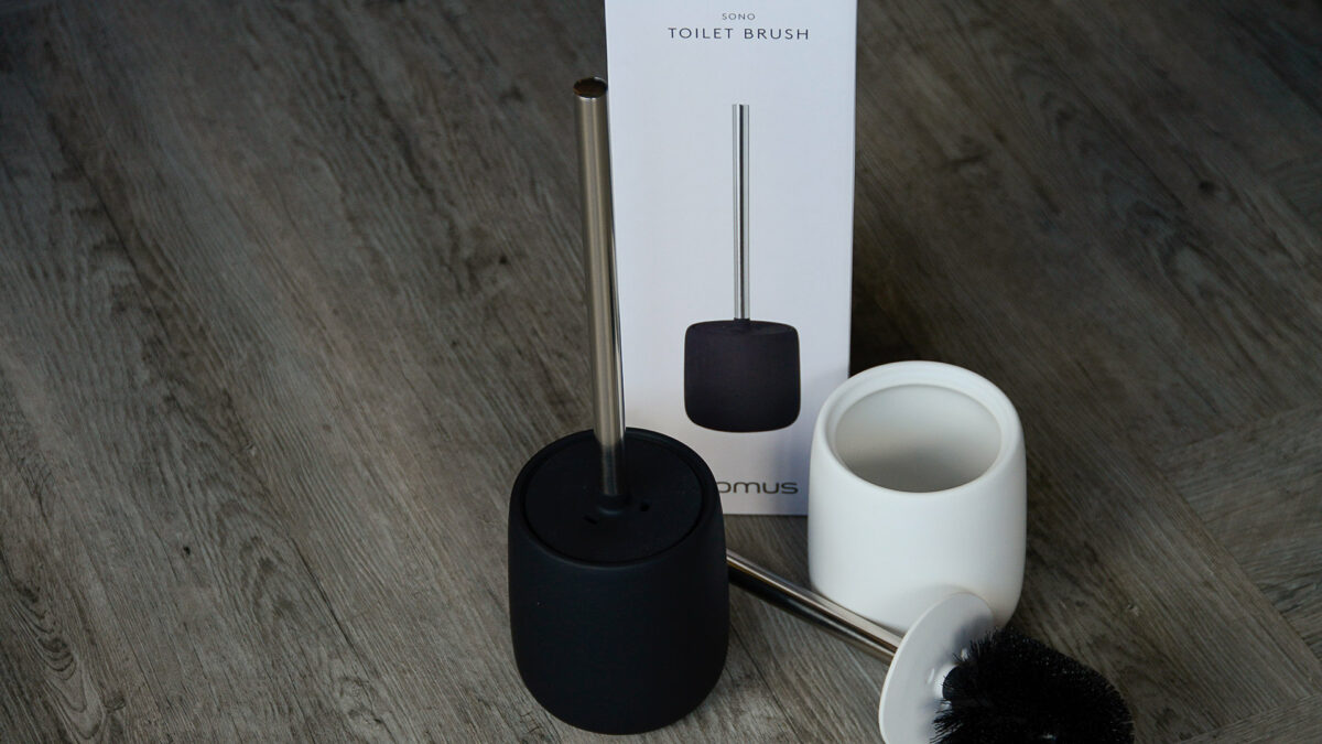 soft touch toilet brush set with stainless steel handles in black and white