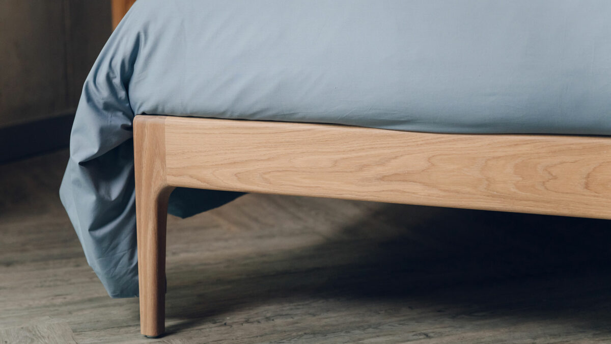 a close look at the Bloomsbury bed leg in an oiled oak finish