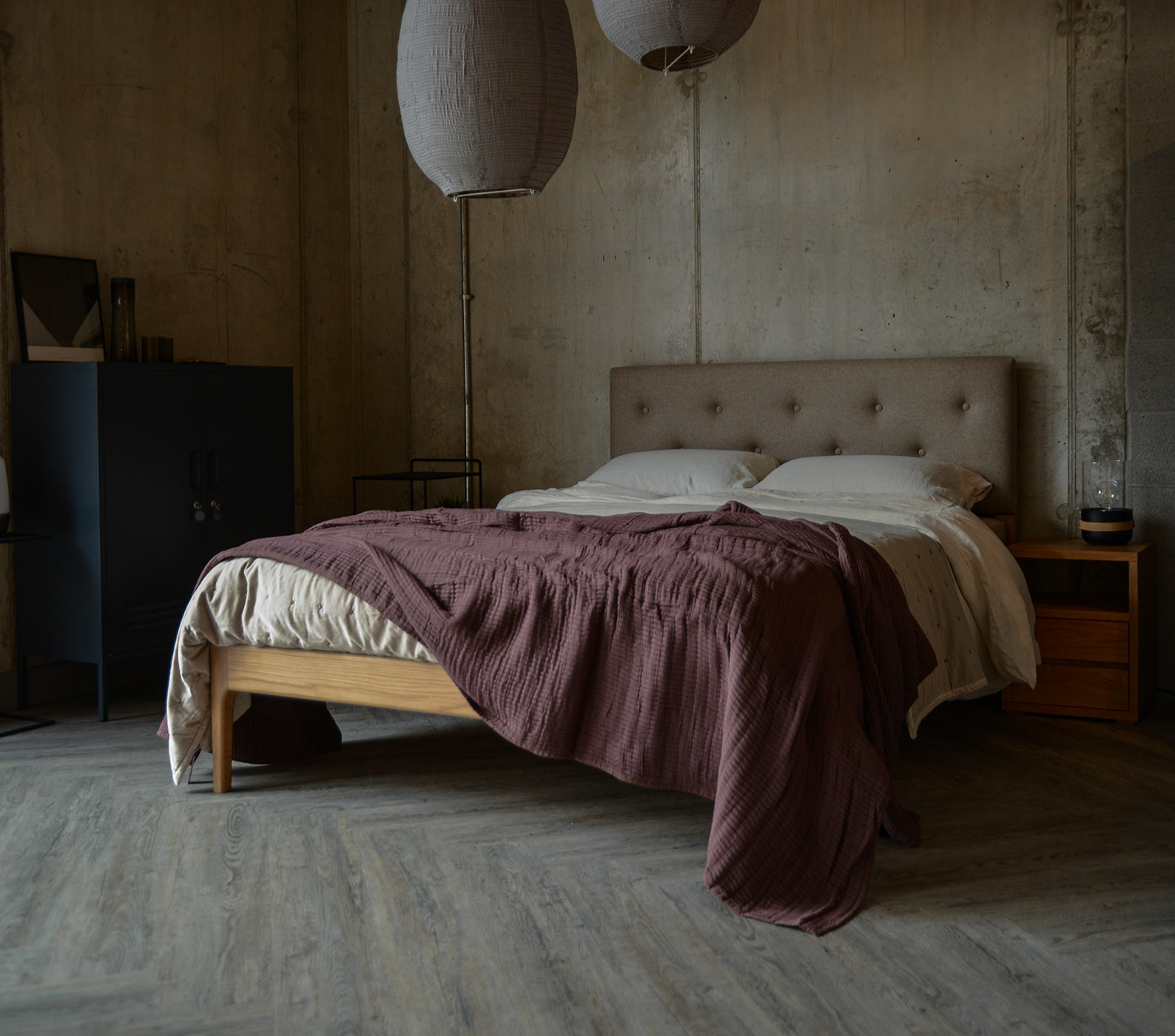 Hand made Bloomsbury bed in oak with a wool upholstered headboard.