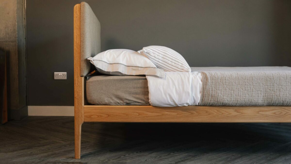 Side view showing the Upholstered Bloomsbury bed Headboard and Oak frame