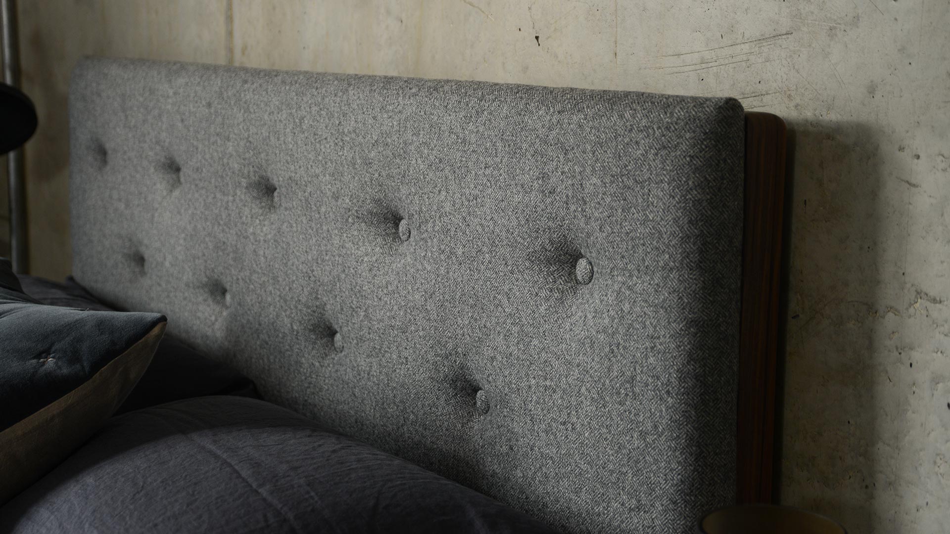 A closer view of the buttoned upholstered Bloomsbury bed headboard