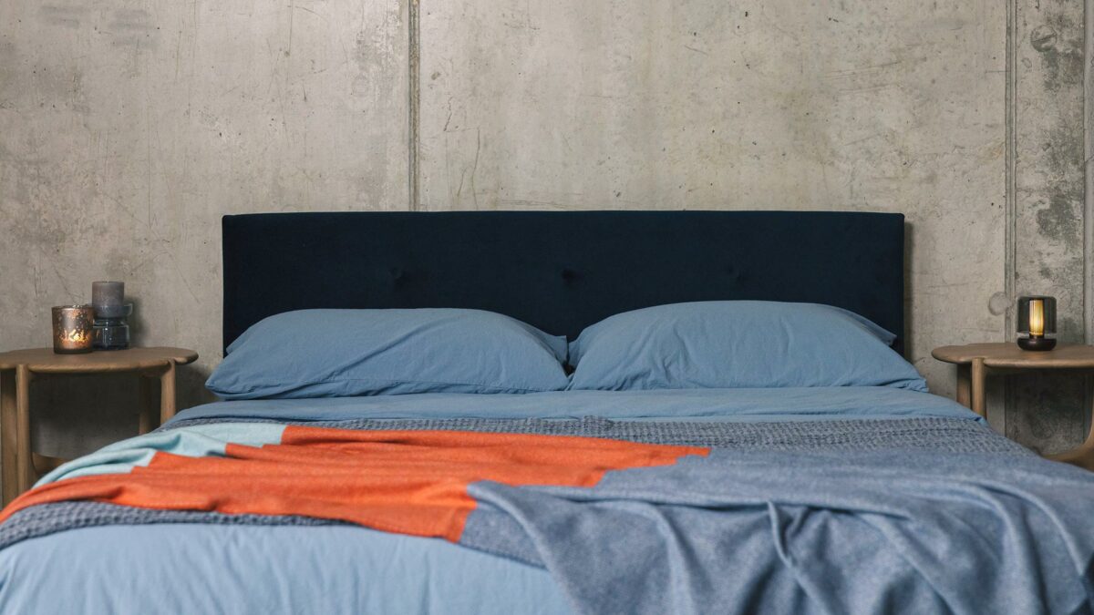 blue and orange bedding with iona bed