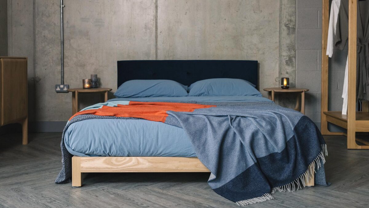 blue and orange cashmere throw with iona bed and stonewash bedding