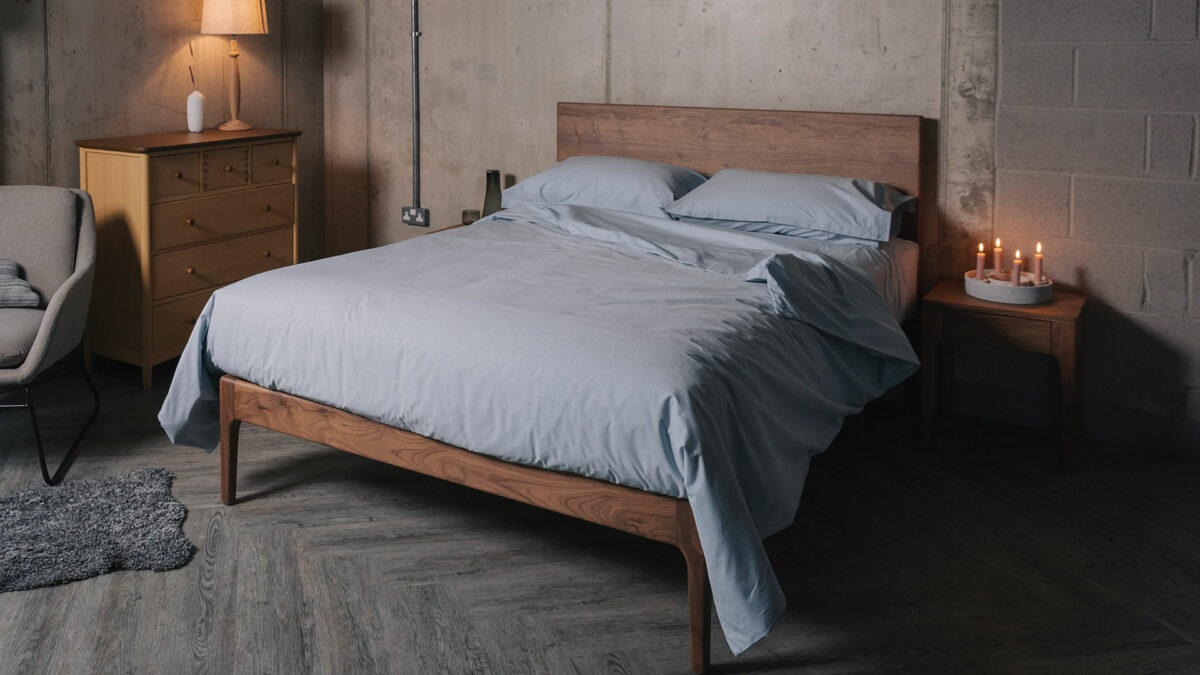 blue chambray bedding on walnut chiswick bed