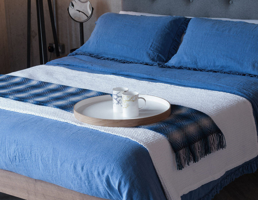 blue linen bedding with waffle throw & bronte throw