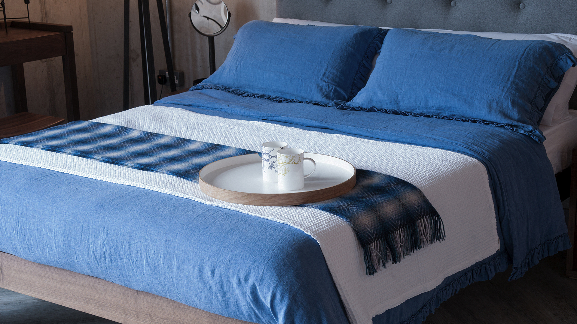 blue linen bedding with waffle throw & bronte throw