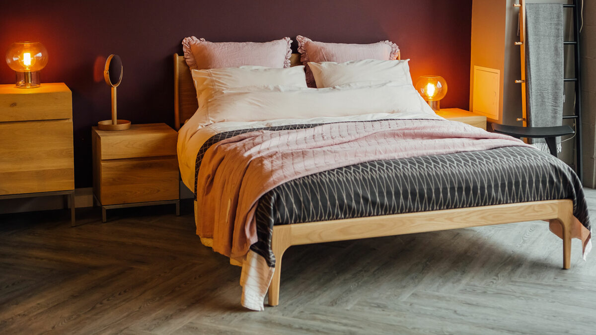 blush and grey bedding on our Camden Wooden bed