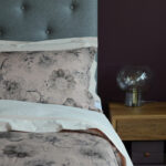 blush printed linen blend bedding on Skye wooden bed with padded headboard