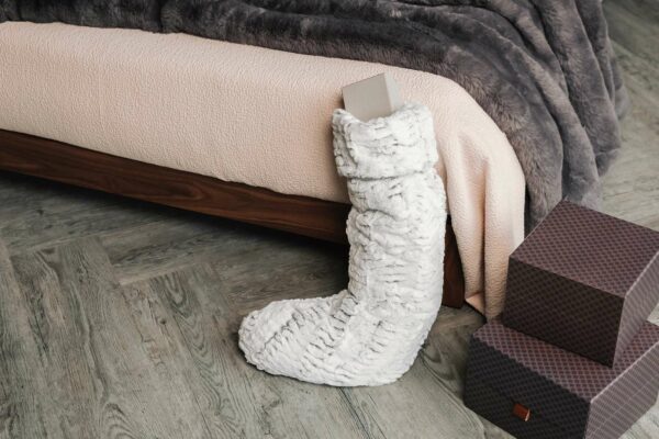 Christmas bedroom with faux fur xmas stocking