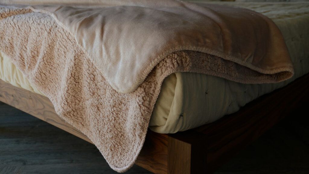 softest fleecy microfibre throw in blush pink