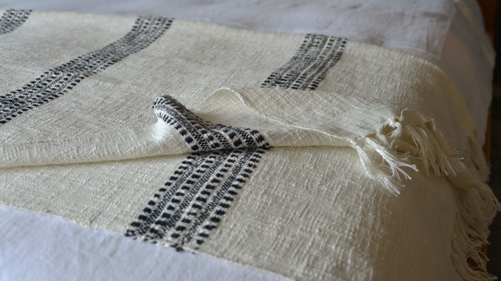 open weave cotton throw in ivory and black