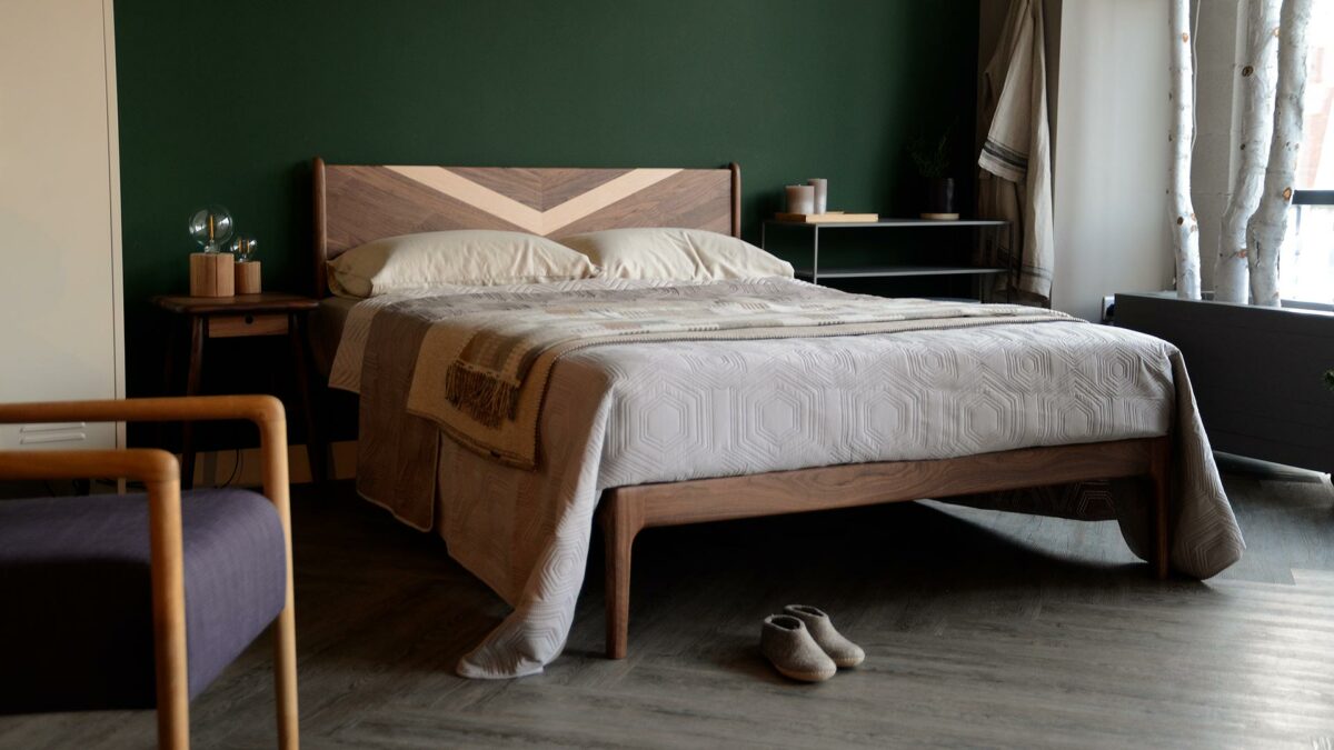 Hand made walnut Hoxton bed with bold chevron maple wood inlay