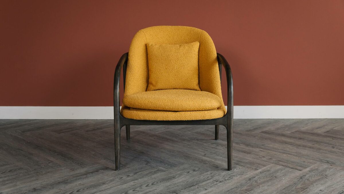 boucle and dark wood chair mustard