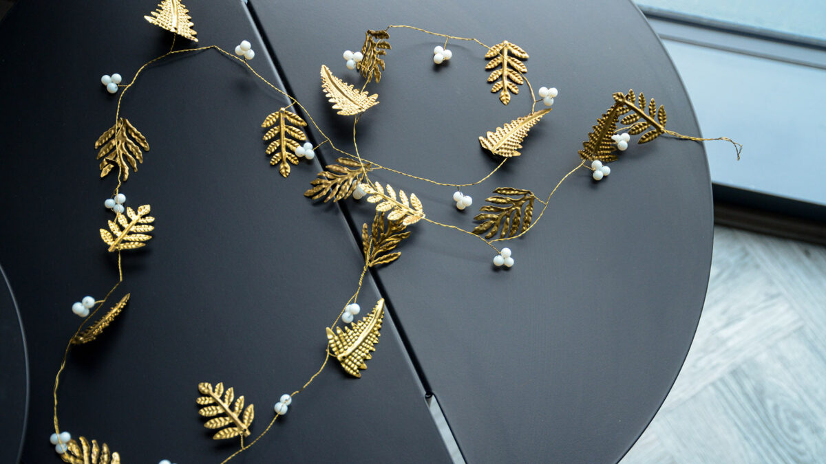 brass colour garland with ivory beads
