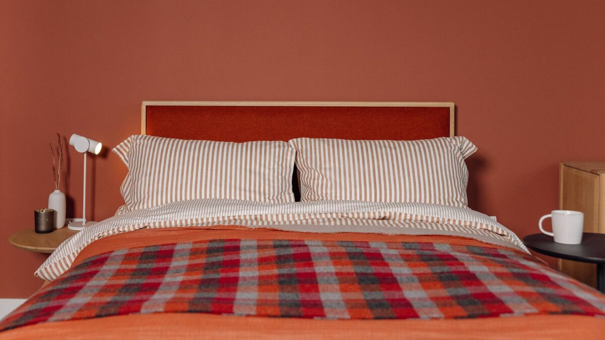 brick red bedding on the carlisle bed