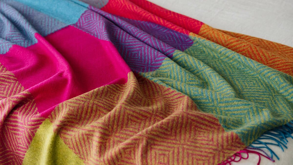 bright colourful throw with diamond and block pattern
