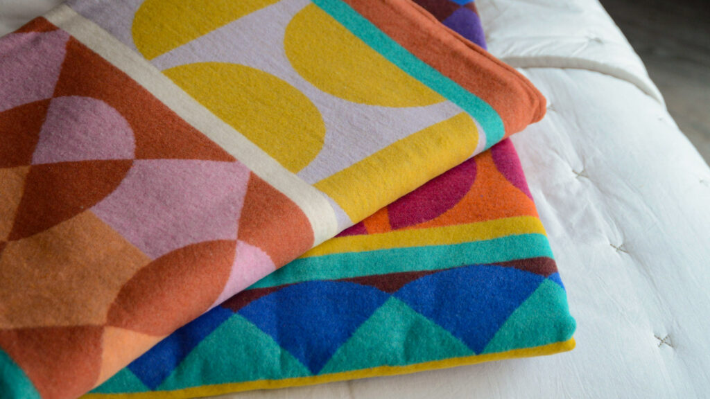 modern brightly coloured and patterned soft cotton blankets