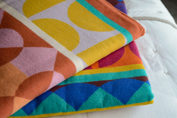 modern brightly coloured and patterned soft cotton blankets