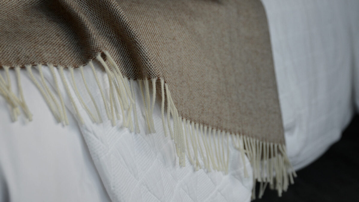 brown and ivory tiny spot throw