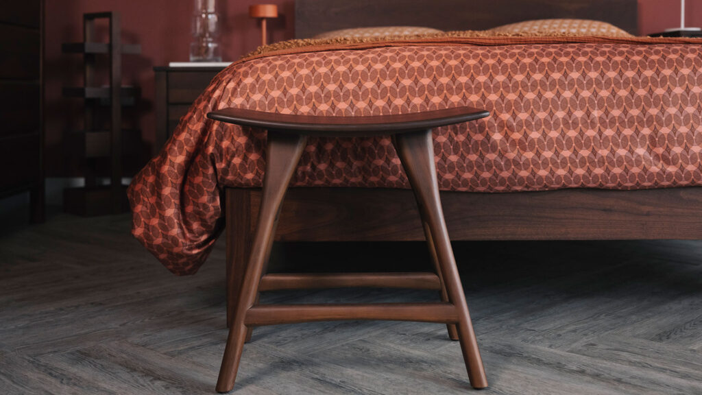 brown finish osso stool with smoked walnut Malabar bed
