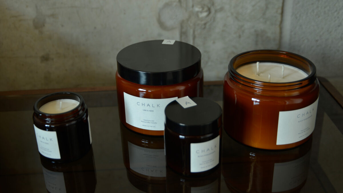 brown glass jars with scented candles