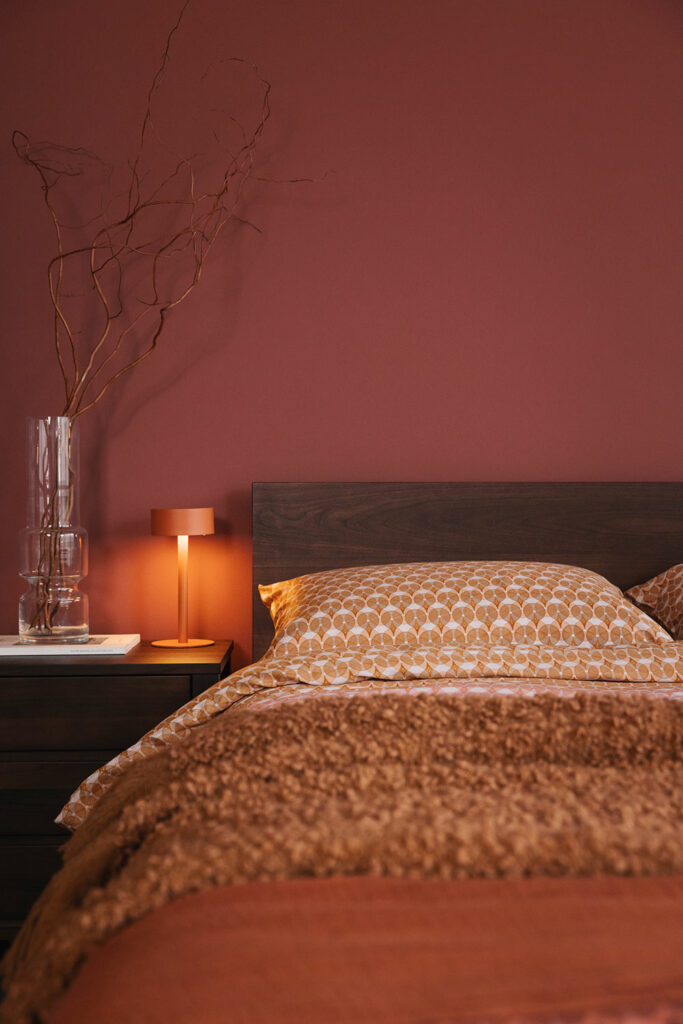 burt orange bedding with lamp portrait