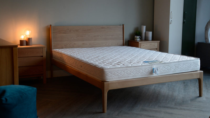 The Camden bed is a mid century style hand made wooden bedframe shown here in Oak