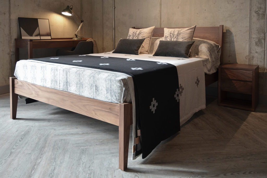 Solid wooden Classic Zanskar Bed shown in Walnut but available to order in a range of wood options.