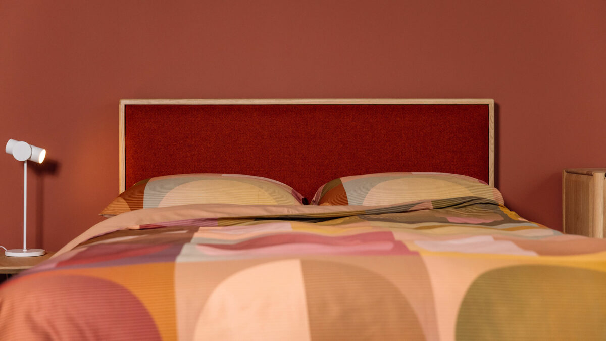 carlisle bed headbpard with modern bedding