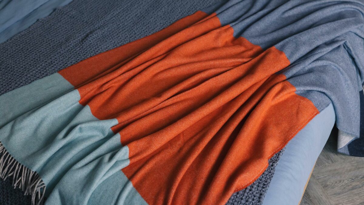 cashmere throw in blue and orange